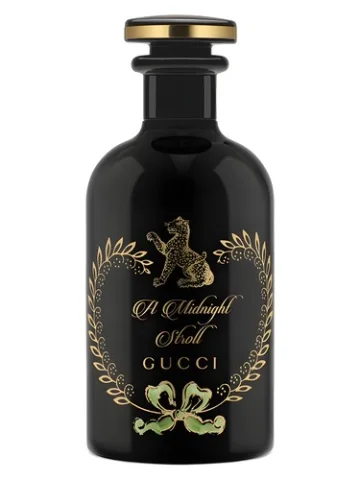 A Midnight Stroll perfume bottle, front label visible